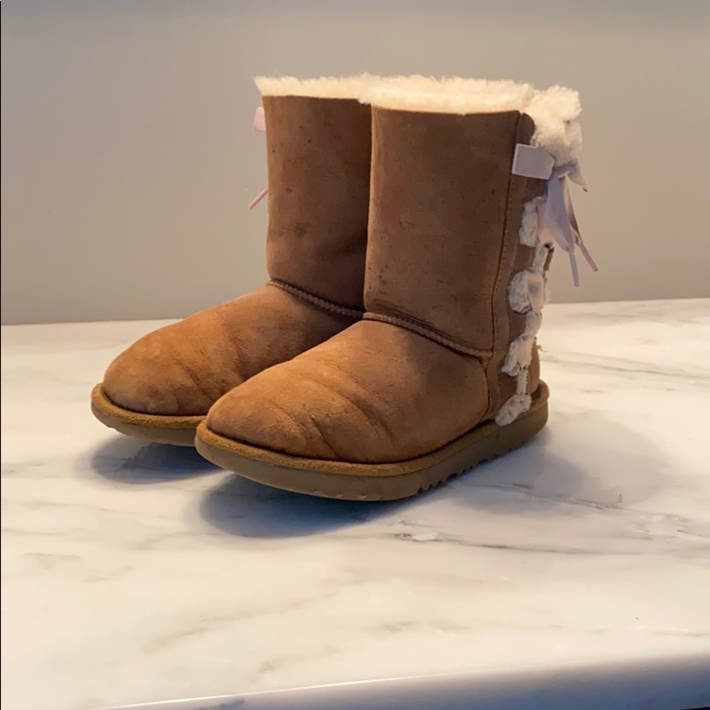 UGG Boots with Pink Ribbon on Side